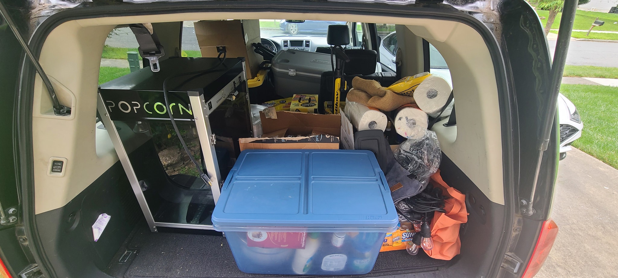 Car packed with the popcorn machine and campout supplies ready to go — Campout 2023