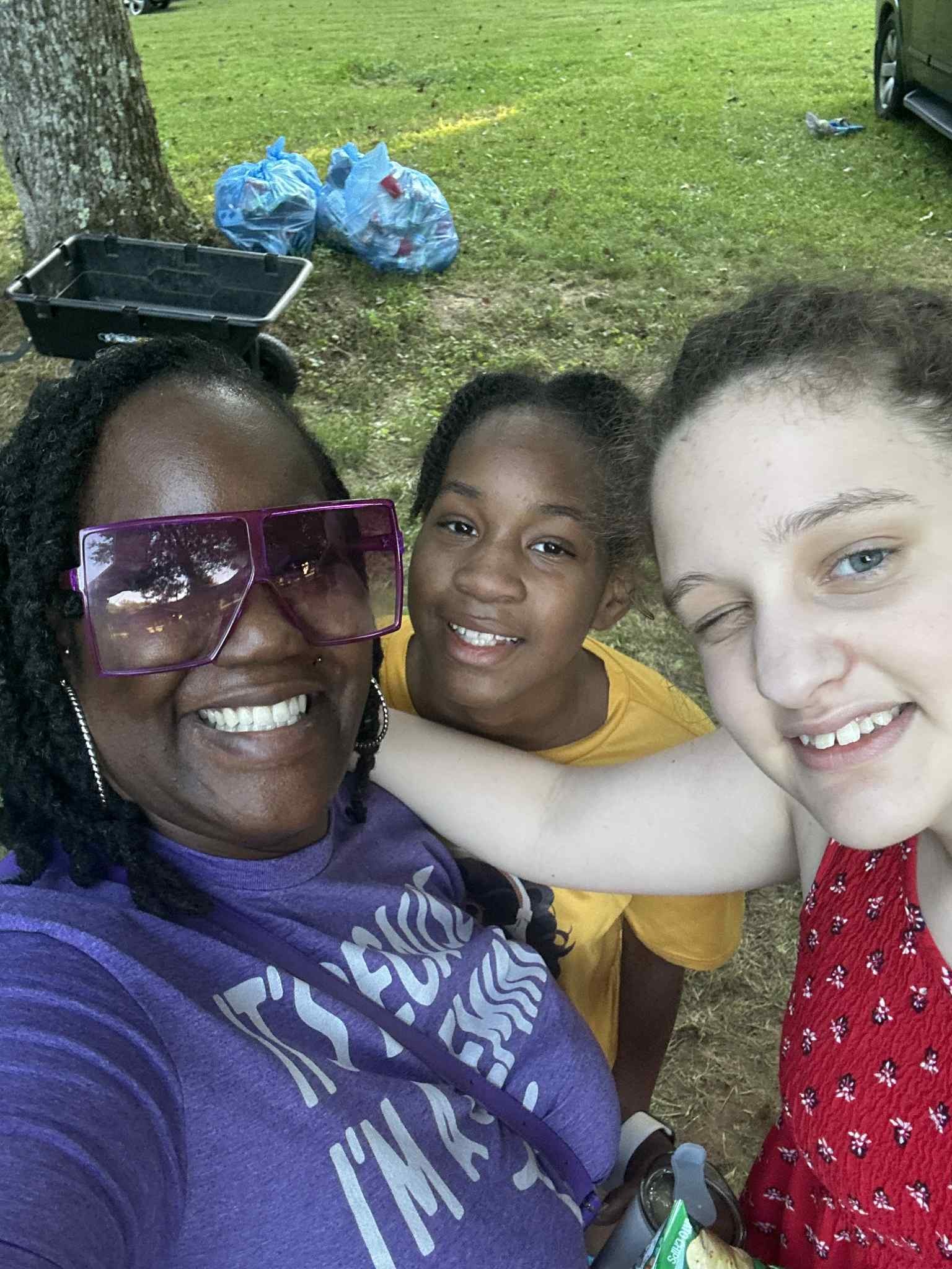 Big pink sunglasses, a selfie, and kids on the lawn — Campout 2025